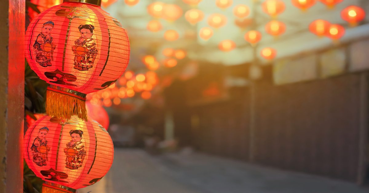 Chinese red lanterns hanging outside in the street